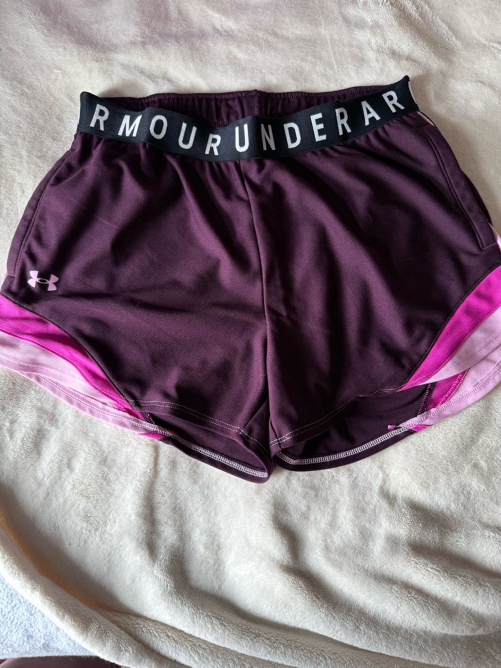 Women’s Under Armour Women's purple and pink athletic shorts size small